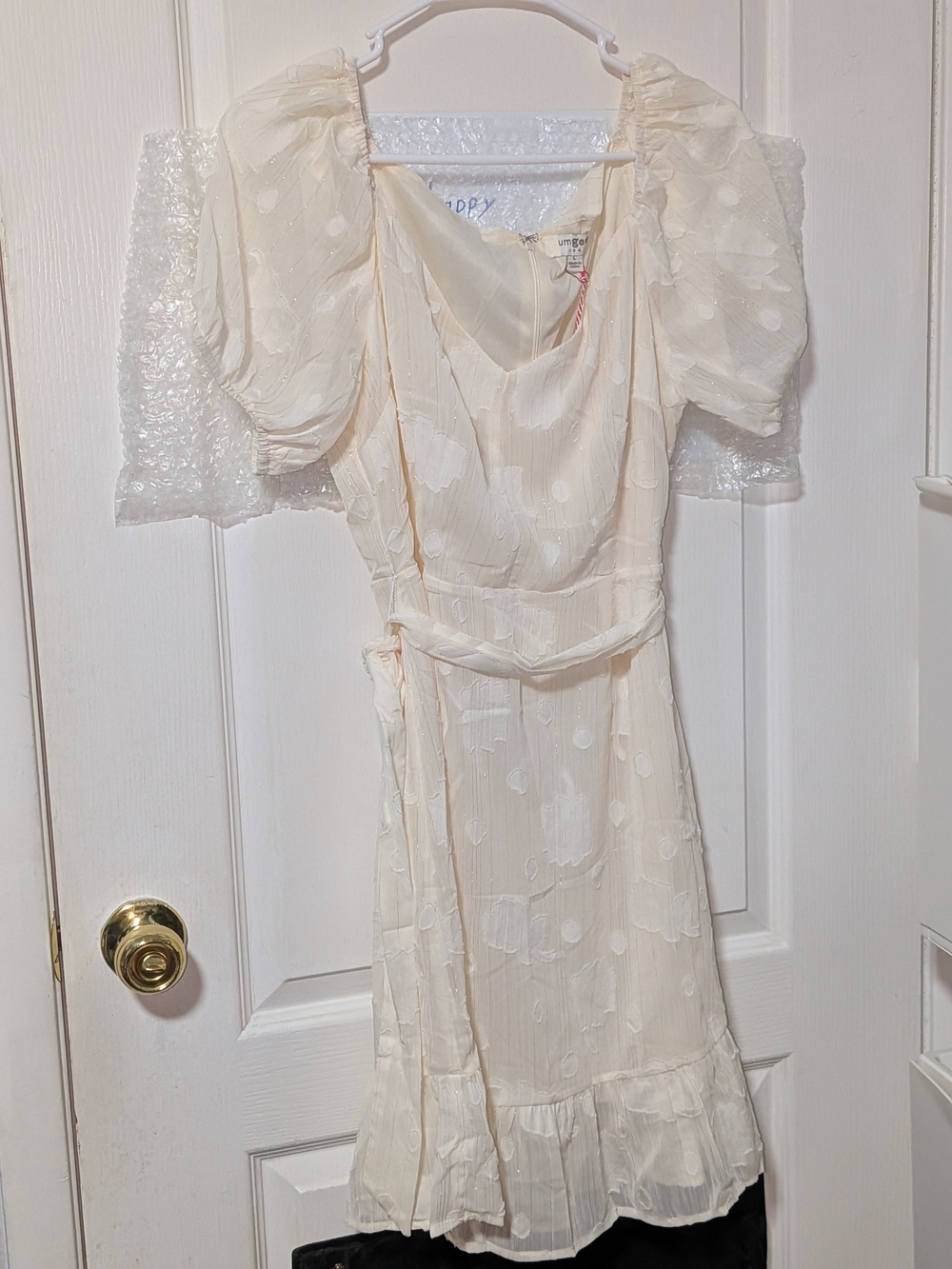 Adorable V neckline cream Umgee dress with shimmering details & ruffles
